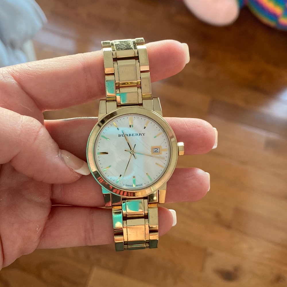 Pretty good condition. Golden stainless steel Burberry watch. Minimal scratches